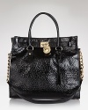 MICHAEL Michael Kors crafts an impossibly polished tote in the season's best structured shape.