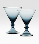 A stirring pair of martini glasses designed with fabulous color and a dramatic silhouette inspired by city skylines. From the High Rise Collection Set of 2 6 oz. capacity 5¼ high Dishwasher safe Imported 