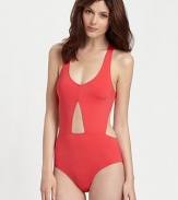 A cut above the rest. A classic swim design that features strategic cutout details along the waist for seductive appeal. Cutout detailsRacerbackHigh-cut legs85% polyamide/15% elastaneHand washImported