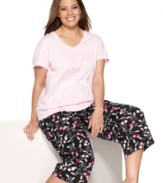 An adorable print puts the cherry on top of this cozy pajama set featuring a soft cotton top and capri-length pants.