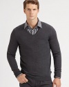 Slim-fit extra-fine merino wool sweater with contrast color detail at inside collar trim.V-neckRibbed knit cuffs and hemWoolDry cleanImported