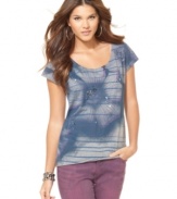 Rendered from 100% cotton, this comfy tee from DKNY Jeans is jazzed up with sequins and a faded floral graphic.