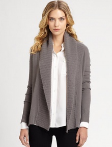 An ultra-cozy knit in luxurious cashmere with an oversized shawl collar. Shawl collarOpen frontRibbed trim at neckline, cuffs and hemAbout 26 longCashmereDry cleanImported