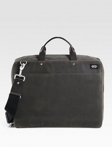 An updated classic with metropolitan style, crafted in sleek and sturdy waxed cotton with leather details.Zip closureTop handlesAdjustable shoulder strapExterior, interior zip pocketOrganizing pocketsFully lined12W x 16H x 3DImported