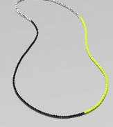 A trio of contrasting colors make this a stand-out piece. Glass and acrylic beadsLength, about 43Slip-on styleImported 