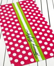 Pretty in pink. A white and hot pink polka dot pattern give this Tommy Hilfiger beach towel a perfectly preppy flair. Finished with a chic lime green and white stripe and the Tommy Hilfiger signature.