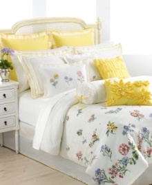 Sculpted of pure cotton, this European sham from Lenox features a bright ground of daffodil yellow with delicately embroidered dots and scalloped edges. So graceful and elegant, this European sham enhances the charming Flowering Meadow bedding collection.