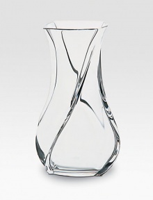 A remarkable vase crafted in France with smooth, fluid lines and a graceful shape. An elegant piece ideal for favorite flowers or nothing at all. From the Serpentin Collection 6 high Hand wash Made in France 