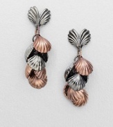 A whimsical drop of seashells in a two-tone design. Rose goldtone and hemetite-finishedDrop, about 2Post backImported 