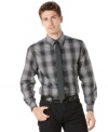 This plaid shirt by Perry Ellis will set your look into cool dapper style.