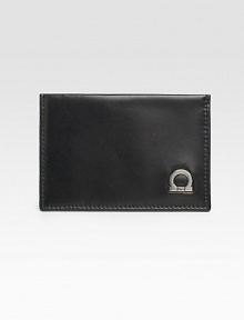 A slim-line design that fits smoothly into an inner blazer pocket in superior calfskin leather with signature gancio detail. Three credit card slots 4½ X 3H Made in Italy