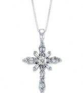 A sparkling symbol of faith. This beautiful cross pendant features round and baguette-cut diamonds (1/2 ct. t.w.) in 14k white gold. Approximate length: 18 inches. Approximate drop: 1-1/16 inches.