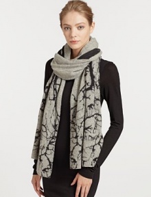 An ultra-soft, ultra-luxe cashmere design is adorned with a large tree print.Cashmere24 X 74Dry cleanImported