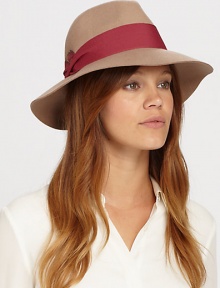 Remain warm and stylish this season with this floppy fedora style trimmed with pleated cotton band and feather detail for a timeless finish.WoolOne size fits mostSpot cleanImported