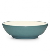 Make everyday meals a little more fun with Colorwave dinnerware from Noritake. Mix and match this rim soup bowl in turquoise and white with coupe and square pieces for a tabletop that's endlessly stylish.