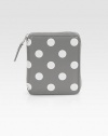 A classic contrast of painted polka dots on luxe leather with a zip around closure. Top zip closure One inside snap pocket One inside bill slot Four credit card slots Leather lining 4W X 5H X 1D Imported