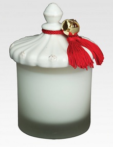 Rich and enticing with notes of white pine, fir balsam, golden amber and cedar wood intwined with rich wintertime spices. Once emptied the glass votive and ceramic topper can be used to hold seasonal treats and treasures.Glass vesselCeramic lidCandle hand-poured in USAAbout 5 highImported