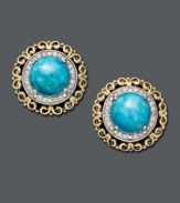 These studs are anything but simple. Ornate 14k gold and sterling silver setting features a round-cut turquoise center stone edged with sparkling round-cut diamond accents. Approximate diameter: 1/2 inch.