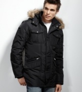 Look cool while you get warm. This nylon puffer from INC International Concepts can weather anything.