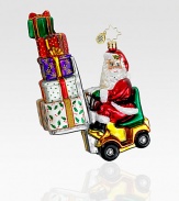 The elves need some help this year and Santa knows exactly what will do the job: A festive forklift! Hand-blownHand-painted6½ tallMade in Poland