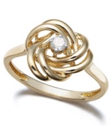 The golden touch. Swirls of 14k gold surrounding a round-cut diamond (1/10 ct. t.w.) turn Wrapped in Love's™ knot-shaped ring into a timeless piece.