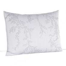 Delicate floral vines wind across solid cotton jacquard on duvets and shams in this luxe collection by Vera Wang.