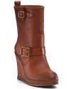 Luxe leather contrasts with structured buckles on these Lucky Brand boots, carrying on the towering wedge trend.