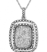 Genevieve & Grace know glam. This sparkling pendant combines an emerald-cut silver druzy with glittering marcasite edges. Set in sterling silver. Approximate length: 18 inches. Approximate drop length: 1-1/2 inches. Approximate drop width: 15/16 inch.