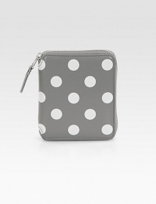 A classic contrast of painted polka dots on luxe leather with a zip around closure. Top zip closure One inside snap pocket One inside bill slot Four credit card slots Leather lining 4W X 5H X 1D Imported