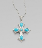 This cross of vibrant turquoise is framed in sterling silver and punctuated by luminous diamonds.Diamond, 0.15 tcw Sterling silver Pendant length, about 2½ ImportedPlease note: Chain sold separately 