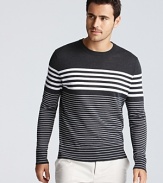 Variegated stripes and a solid shoulder panel bring a minimalist-modern appeal to Vince's lightweight cotton sweater.