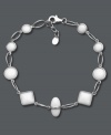 Smooth white agate stones (6 mm, 8 mm and 9 mm) in round, square and oval shapes create a geometrically-chic look. Set in sterling silver. Approximate length: 8-1/2 inches.