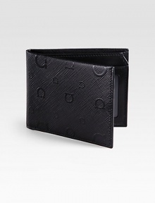 Textured leather design embellished by signature gancini detail, with interior ID window.One billfold compartmentFour card slotsOne identification windowLeather4W x 3HMade in Italy