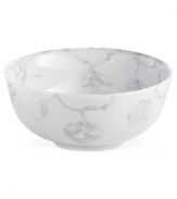 Michael Aram branches out from his renowned metal collection with the Botanical Leaf all-purpose bowl. Simple foliage rooted in fine Limoges porcelain brings a lightness and ease to modern tables in shades of gray.