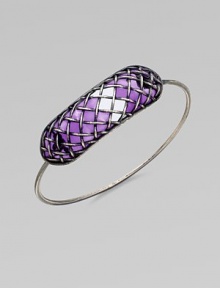 A bold, yet sleek style with a unique lattice pattern over glossy, colored glass. GlassSilverDiameter, about 2.5Hidden closureMade in Italy