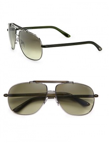 Iconic aviator style crafted in a sleek metal design. Available in shiny gun frames with olive green lenses.Metal100% UV ProtectionMade in Italy