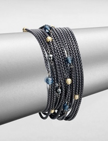 From the Chain Collection. A fluid design with multiple rows of blackened sterling silver box chains accented with 18k gold, hematite and blue topaz stations. Blackened sterling silver18k gold, hematite and blue topaz beadsLength, about 7.25Bar clasp closureImported 