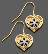 With blossoming flowers set in open hearts, these drop earrings exude pure joy. Crafted in white and yellow 14k gold.  Approximate drop: 3/4 inches.