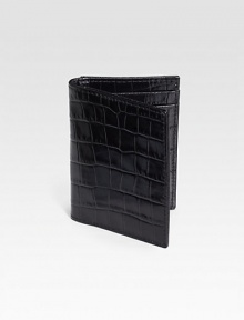 A mini-wallet that offers multiple functions, including four slots to hold cash and cards, plus a window for presentation of your subway/train pass. Ideal for the business exec or frequent commuter. Handmade in croco-embossed calfskin leather 3W X 4¼H Imported 