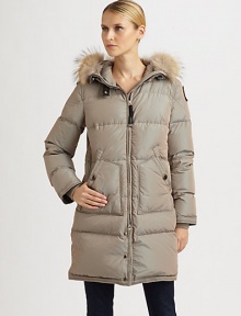 Featuring a convenient hood trimmed in natural raccoon fur, this iridescent puffer coat offers luxurious warmth.Attached hoodRemovable fur trimZipper frontSnap closurePatch pocketsFully linedAbout 35 from shoulder to hemPolyamideMachine washImportedFur origin: USA Model shown is 5'11 (180cm) wearing US size Small. 