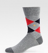 Smooth cotton combines a classic argyle pattern with simple stripes, accented with a signature logo detail.Mid-calf heightCottonMachine washImported