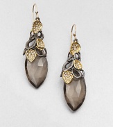 From the Elements Siyabona Collection. A cluster of gunmetal leaves and Swarovski crystal-set goldtone petals holds a faceted teardrop of smokey quartz in these dramatic earrings.Smokey quartzCrystalGoldtone and ruthenium platingLength, about 2.25Ear wireMade in USA