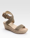 Hand-crochet cotton espadrille with adjustable ankle straps and a slight wedge. Natural jute wedge, 2½ (65mm) Platform, 1½ (40mm) Compares to a 1 heel (25mm) Hand-crochet cotton upper Leather lining Rubber sole Padded insole Imported