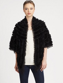 Luxurious rabbit fur with lace insets and trim in a statement-making style that exudes romanticism.Dyed rabbit furOpen frontThree-quarter sleevesAbout 36 from shoulder to hem80% rayon/20% nylon laceSpot cleanImportedRabbit fur origin: China