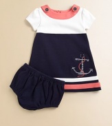 Set sail for this gorgeous, sailor-inspired frock in a classic a-line silhouette with anchor appliqué with matching bloomers.Boatneck with button detailShort sleevesBack buttonsA-lineStriped hemCottonMachine washImported