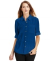 Calvin Klein's button-front blouse offers a new take on a stylish staple thanks to knit panels at the sides.