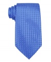 Tonal geometric details add the right combination of flash and texture to this sleek stripe tie from Donald Trump.