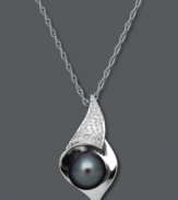 Sculptural and stylish. This unique pendant style features a black cultured freshwater pearl (7-8 mm), sparkling diamond accents, and a sterling silver setting. Approximate length: 18 inches. Approximate drop: 9/10 inch.