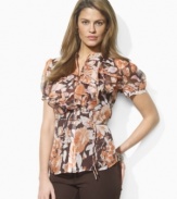 Lauren by Ralph Lauren's airy Phillipe blouse is designed in sheer, crinkled georgette with romantic ruffles and a bright floral print for an elegant modern look.