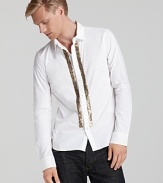 Stripes of metal sequins lend a fashion-forward finish to this button-down shirt from Diesel.